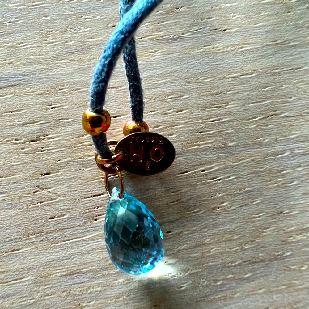 Tous blue topaz pendant in water drop shape